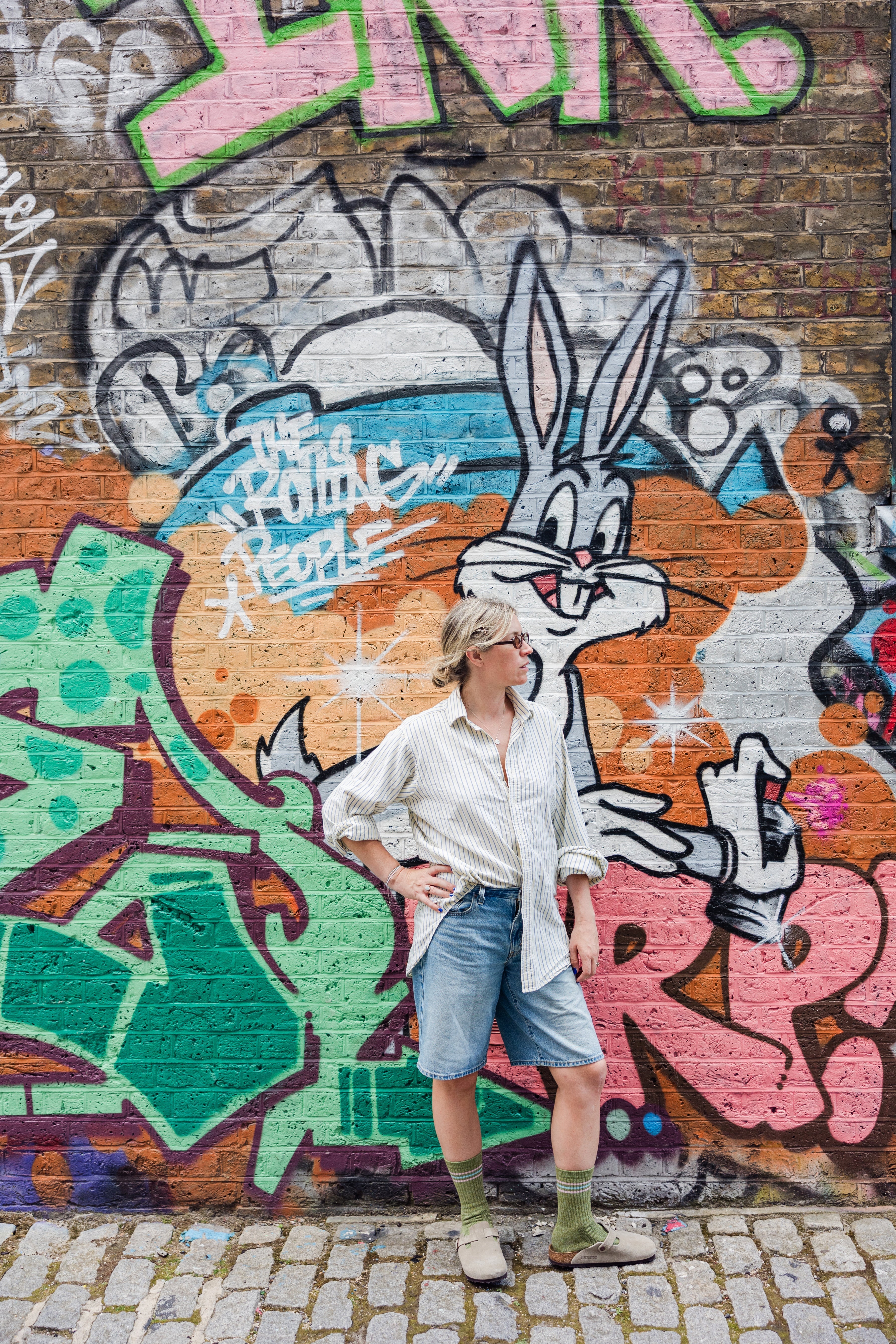 lady wearing sports socks in shoreditch london 