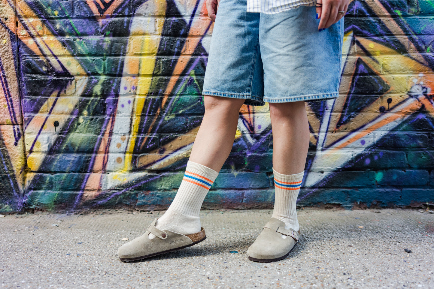 lady wearing sports socks and birkenstocks